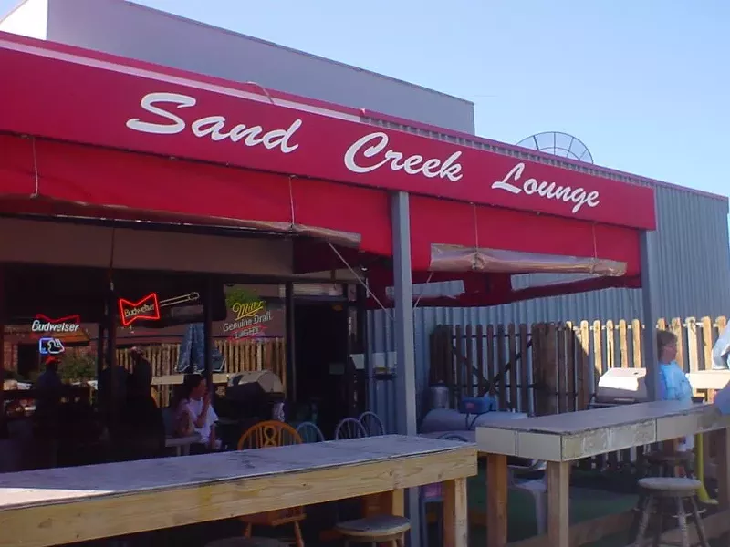 Image: red awning on a patio