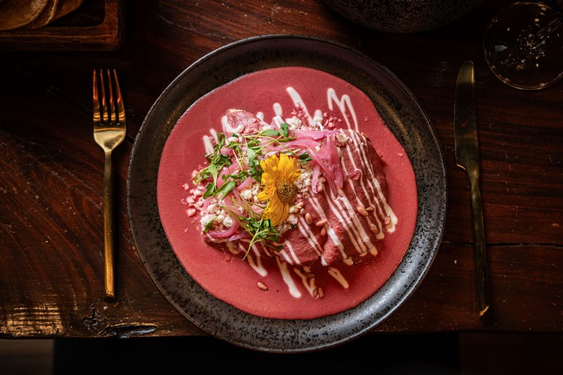 The pink mole at Camelia is made using hard-to-find pink-hued pine nuts.