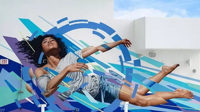 painting of a woman with blue abstract stripes