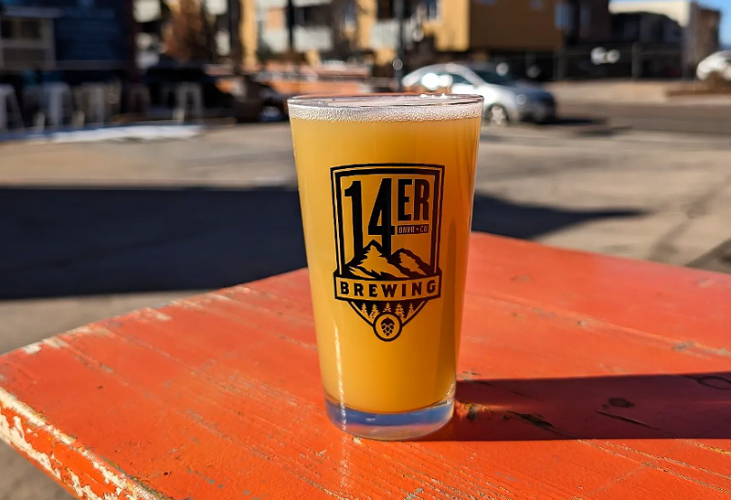 Image: glass of beer on wood table