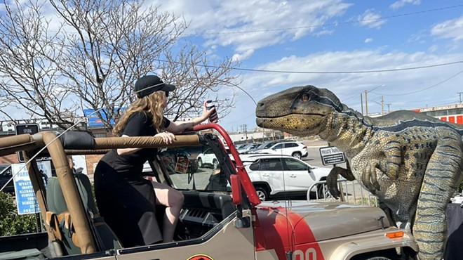 jeep jurassic park with dinosaur