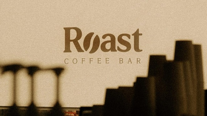 "roast coffee bar" logo behind pump bottles