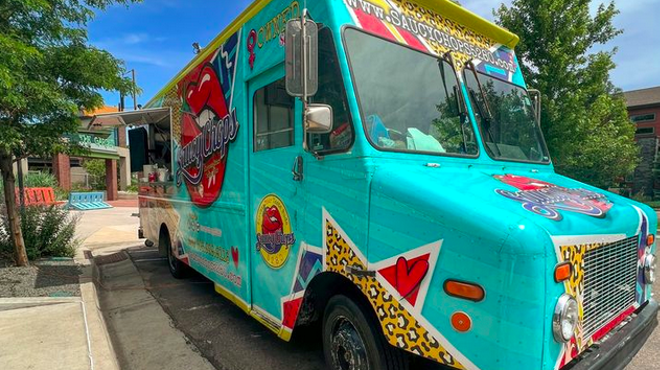 a teal blue food truck