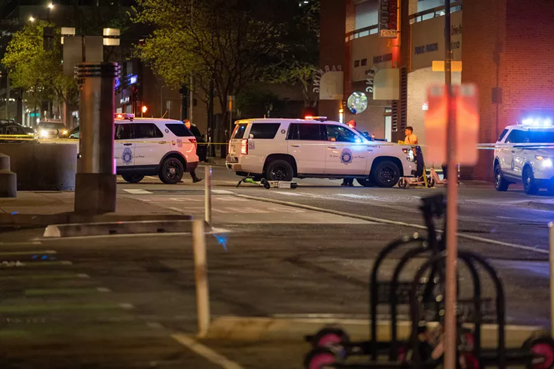 Image: Cops on the scene after a May 7 crash involving a vehicle and two scooter riders.