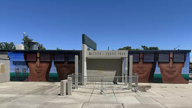 a mural painting of people with sunglasses