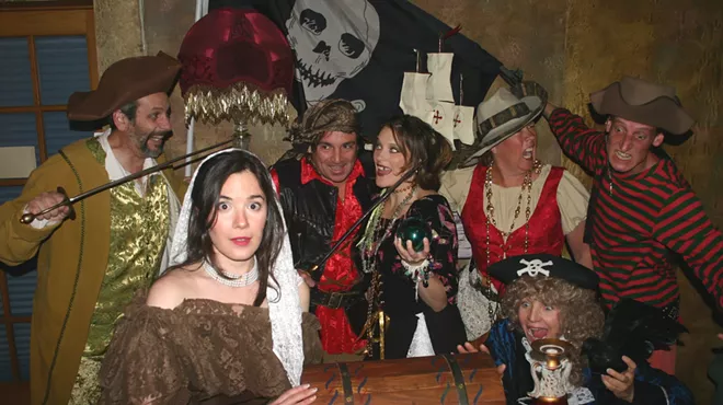 people in pirate costumes