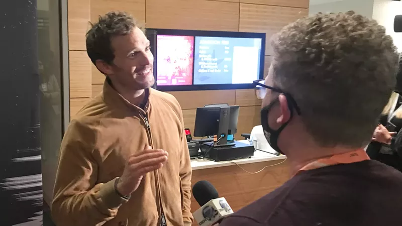 Image: star Jamie Dornan meeting the press at the Denver Botanic Gardens.