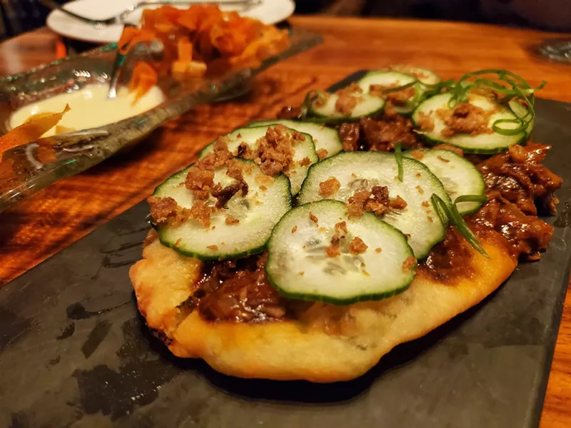 Image: Start your night with Peking duck scallion flatbread at YumCha.
