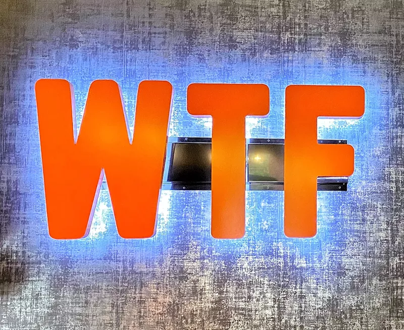 Image: Worth the Time lighted sign at the front desk