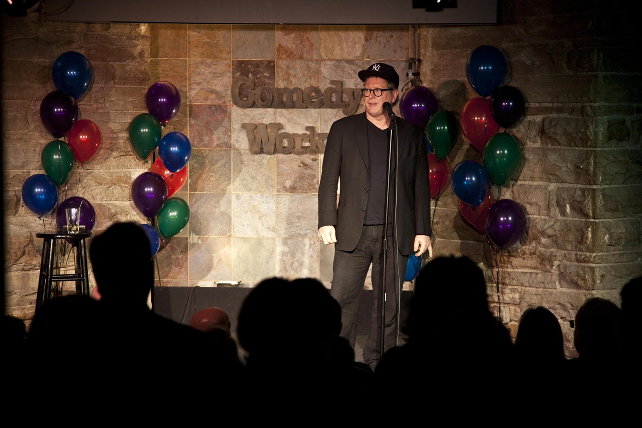 Darrell Hammond performing onstage at Downtown Comedy Works' thirtieth anniversary.