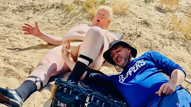 A fat man and a camera guy