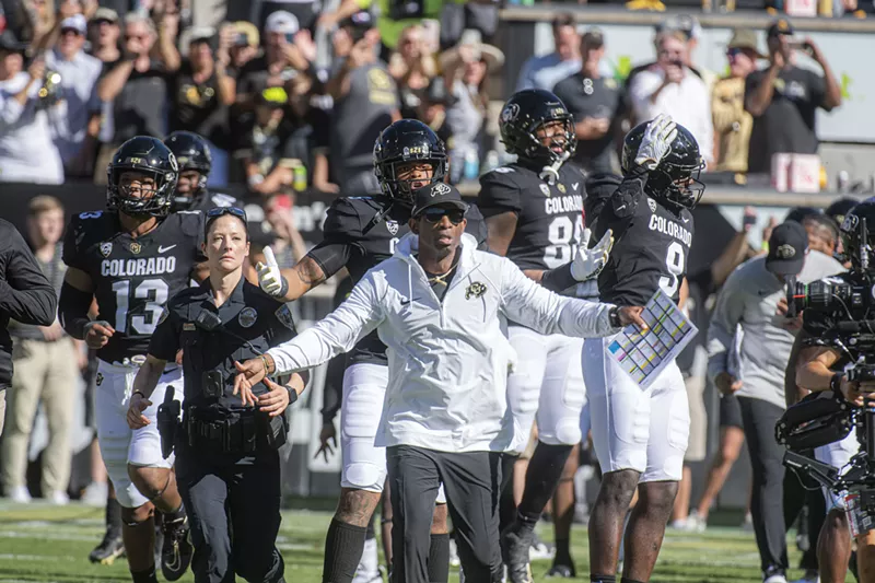 Image: football coach in crowd