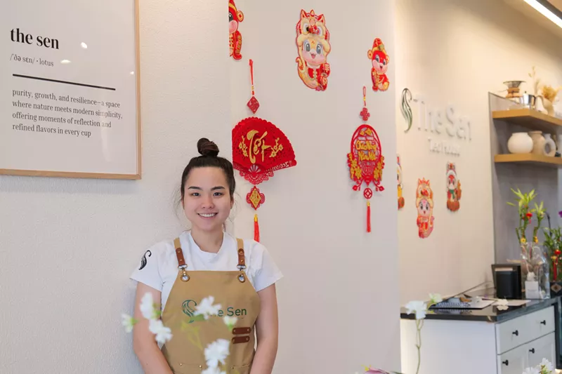 Image: woman in apron posing