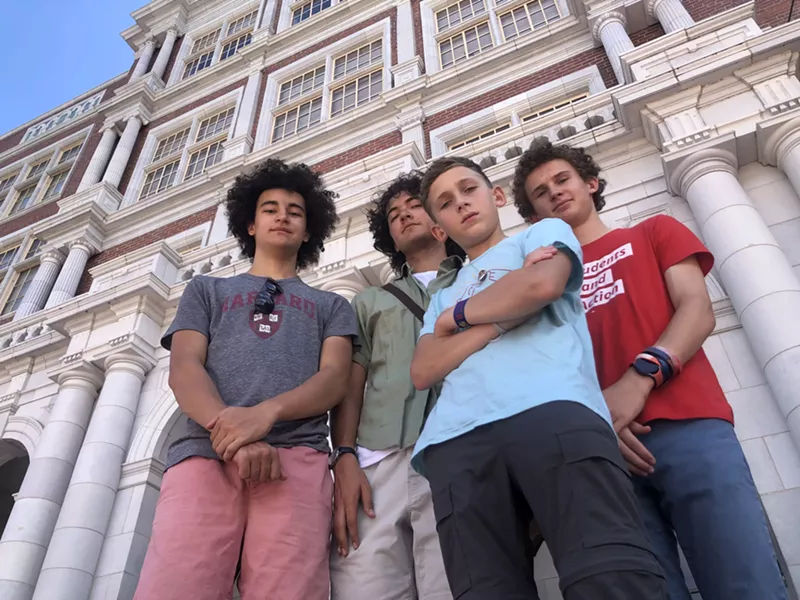 Image: From left: Beckett Nelson-Gardner, Caden Fiala, Seth Shurz and Noah Shurz standing in front of East High School.