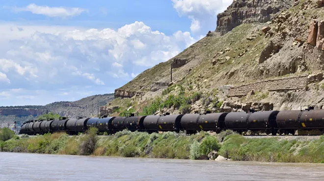 railcars along a river