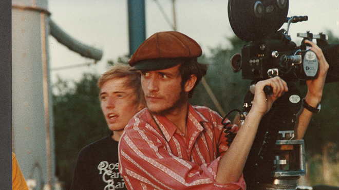 two men filming a movie