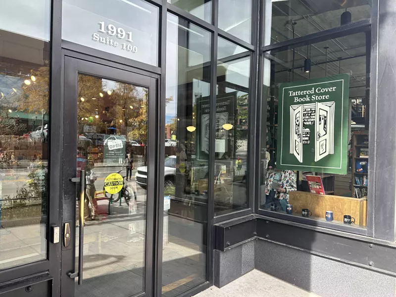 Image: The "Open" sign on the Tattered Cover McGregor Square front door won't be there for long.