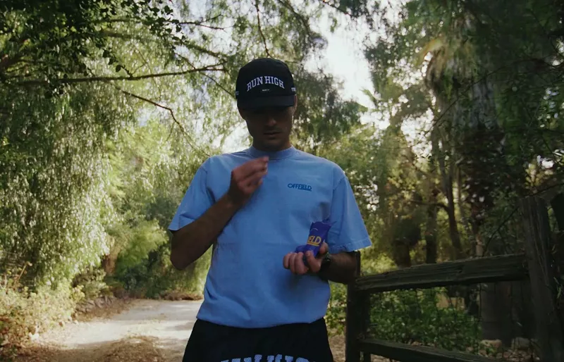 Image: Man eats THC gummy before running