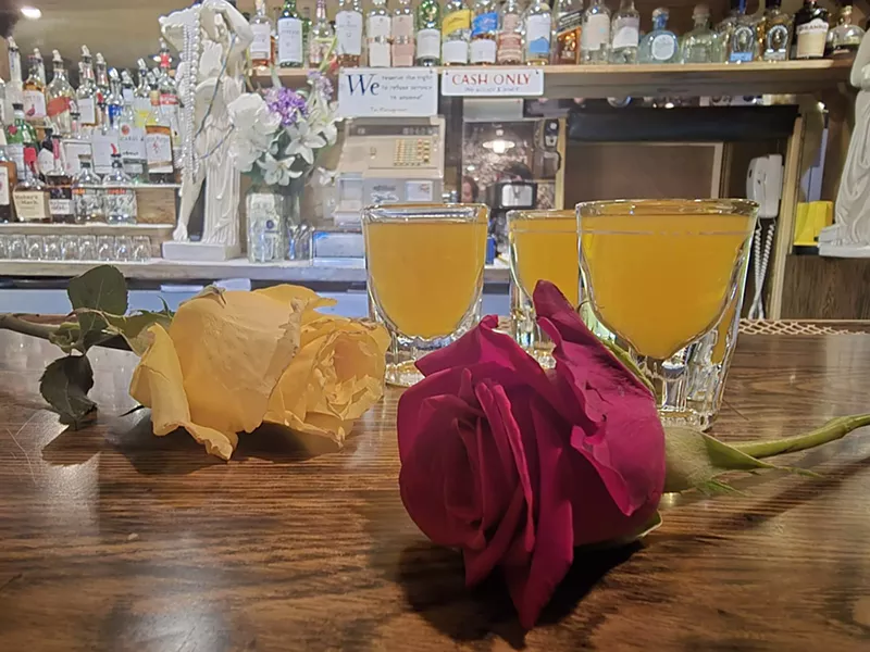 Image: roses and shots on a bar