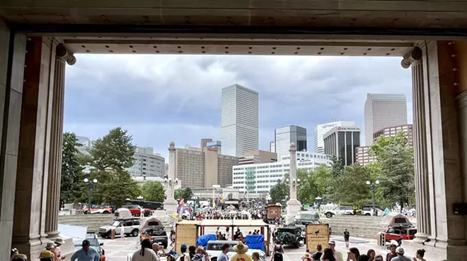 looking through outside amphitheatre at festival-goers