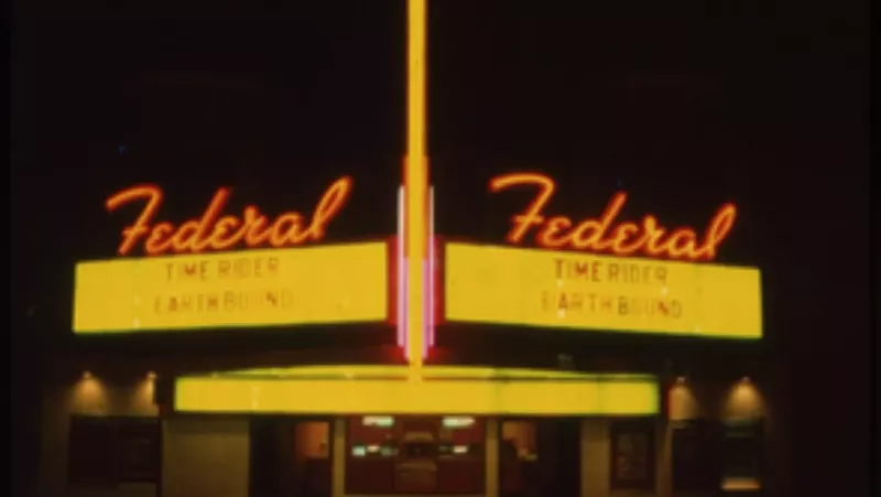 Image: The neon marquee of the Federal Theatre in Denver at night