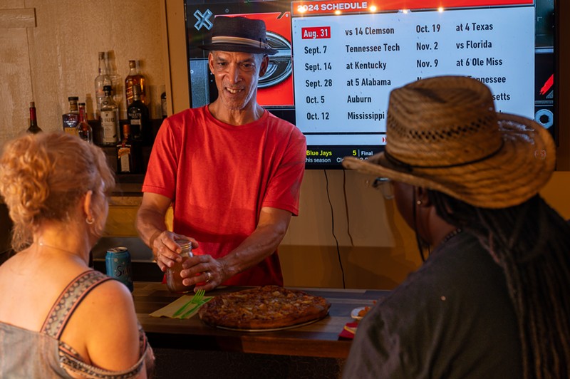 Chef/owner Scott Durrah oversees the action at the Jerk Pit Smokehouse.