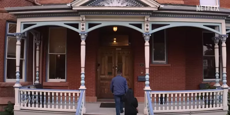 Image: Netflix's 28 Days Haunted climbs the steps to the Lumber Baron Inn.