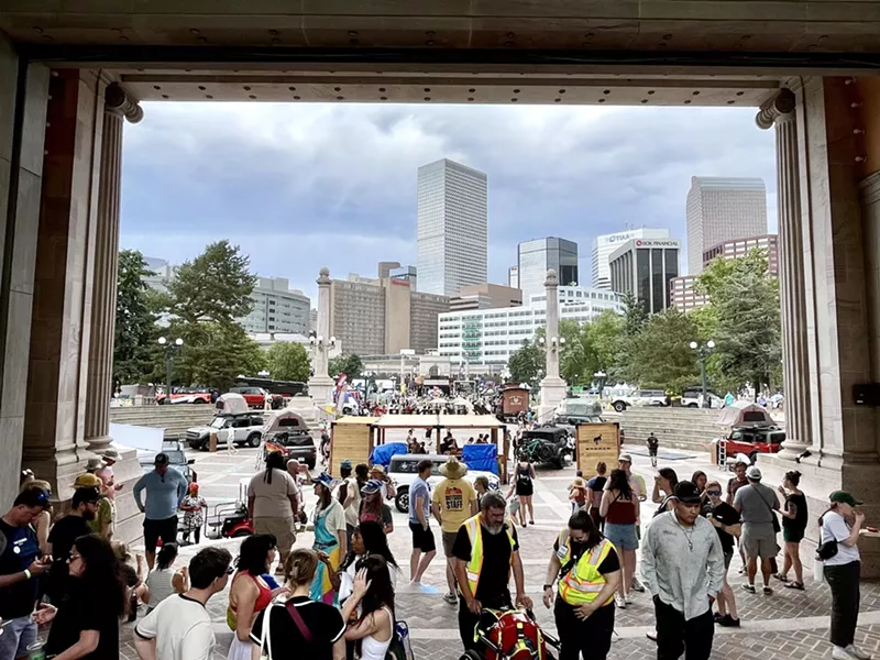 Image: looking through outside amphitheatre at festival-goers