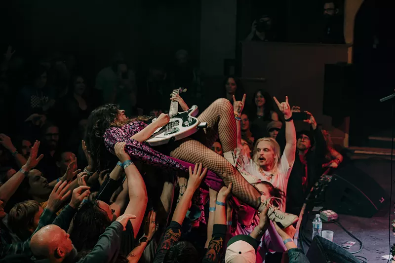 Image: A photo showing Demi Demitro, of the Velveteers, crowd-surfing at the Bluebird Theatre in Denver, Colorado on Friday, April 25, 2025.