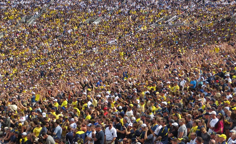 Image: The crowd wave during a Michigan football game