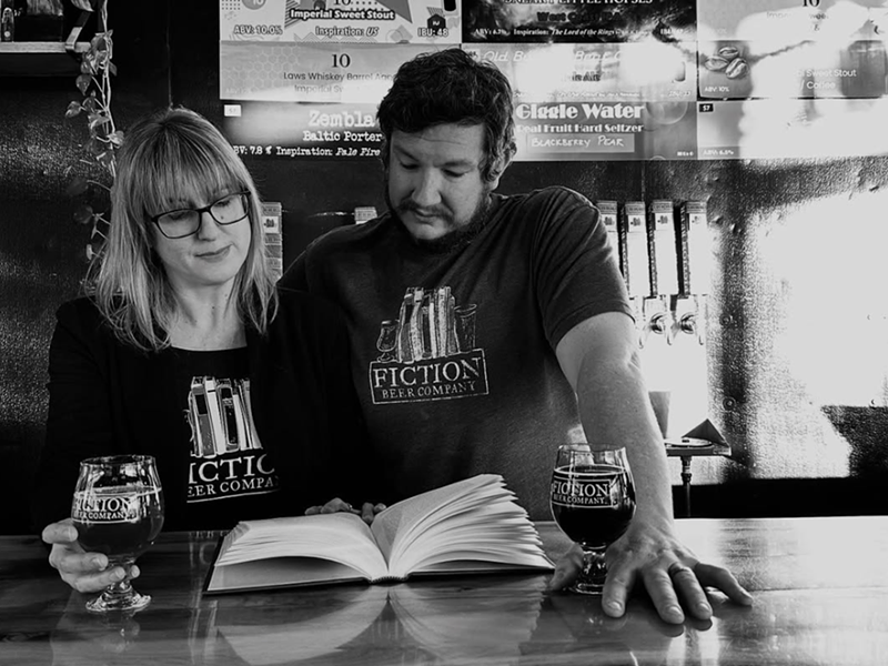 Image: Two brewery owners behind the bar.