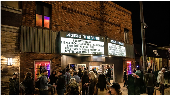 people lining up outside the Aggie Theatre in Fort Collins, Colorado