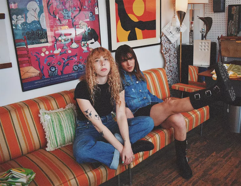 Image: two women on couch