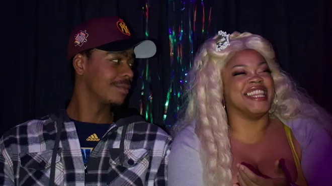 two people smiling