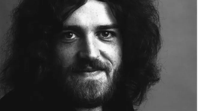 a young Joe Cocker smiles