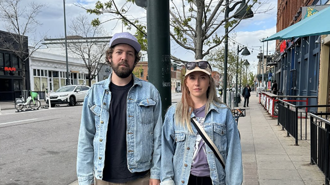 a man and a woman in jean jackets