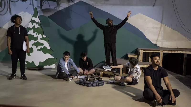 Image: actors on set rehearsing Cannibal: The Musical