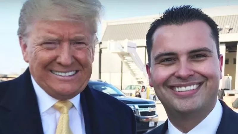 Image: Congressional candidate Dave Williams's website prominently features a photo of him posing with former President Donald Trump.