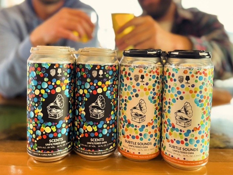 Image: four colorful cans of beer