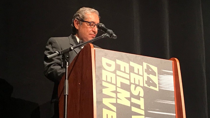 Denver Film CEO James Mejia at the lectern on opening night. - PHOTO BY MICHAEL ROBERTS