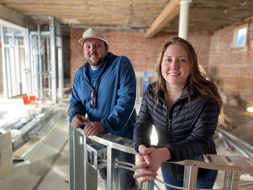 Owners Weston Scott and Shannon Lavelle lean on the skeleton of their bar, soon host to a rotation of visiting breweries. - KRISTIN PAZULSKI