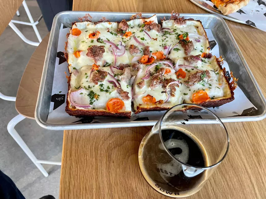 A Detroit-style pizza made with beer in the crust and in the sausage. -JONATHAN SHIKES