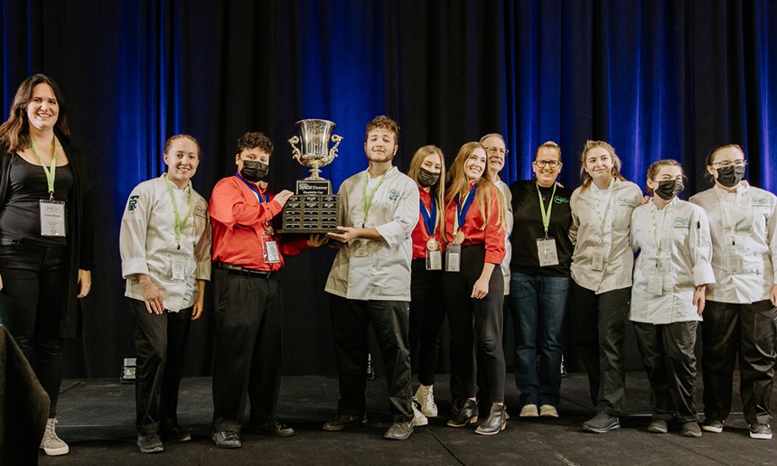 Colorado Restaurant Foundation president Laura Shunk (left) with the Hospitality Cup winner, ThunderRidge High School. - COLORADO RESTAURANT FOUNDATION
