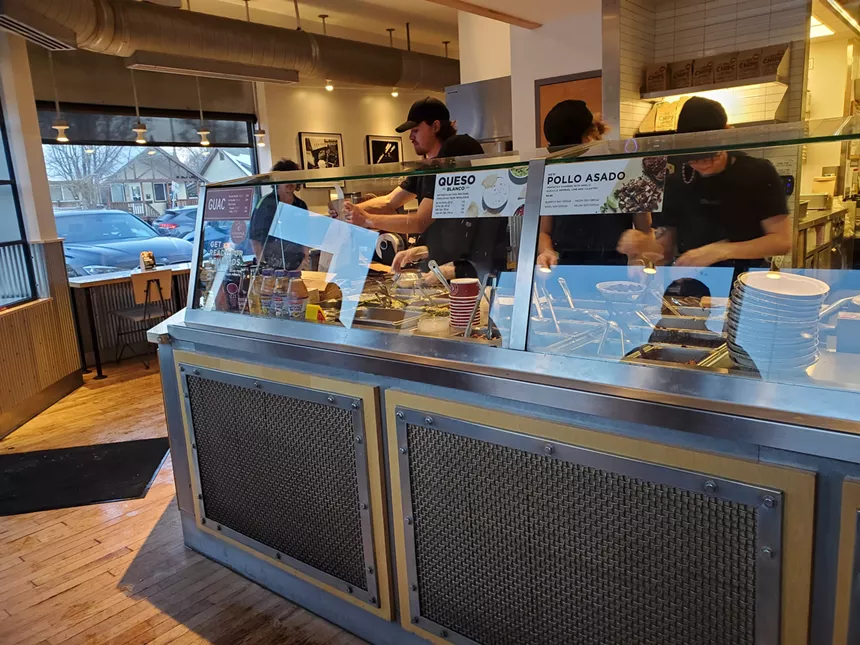 Staff work at a fast pace filling online and in-person orders. - MOLLY MARTIN