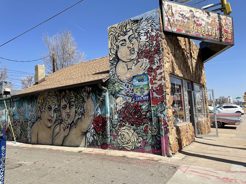 Deborah Orban-Rosen let street artists paint the side of her shop. - CATIE CHESHIRE