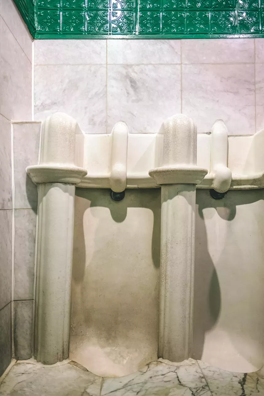 Brian Fouhy captures a urinal at McSorley's Old Ale House in New York City for his book Occupied. - BRIAN FOUHY, NEW HEROES & PIONEERS