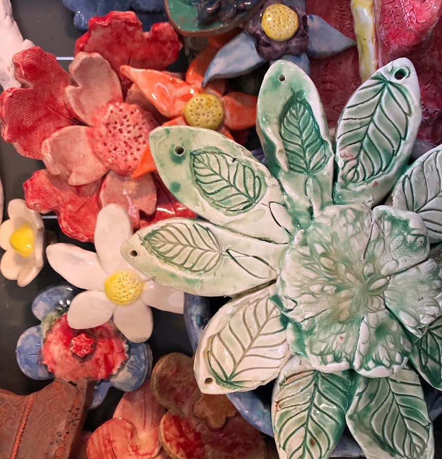 Clay flowers bloom at Access Gallery's Meet the Artists Night. - COURTESY OF ACCESS GALLERY