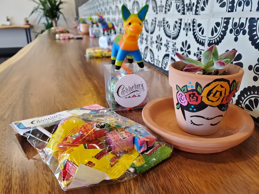 The Carrera brothers' mom made hand-painted Frieda Kahlo potted succulents for the grand opening of her sons' restaurant. - MOLLY MARTIN