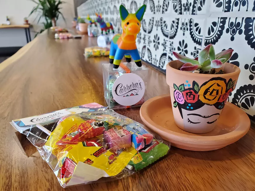 The Carrera brothers' mom made hand-painted Frieda Kahlo potted succulents for the grand opening of her sons' restaurant. - MOLLY MARTIN