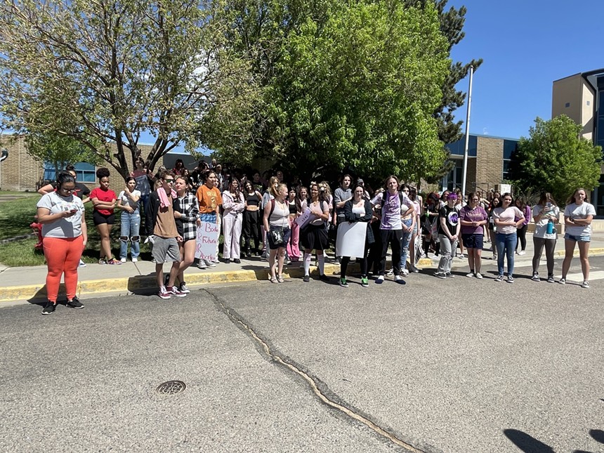 Before walking down Alameda, Green Mountain High School students gathered in a school parking lot. - CATIE CHESHIRE